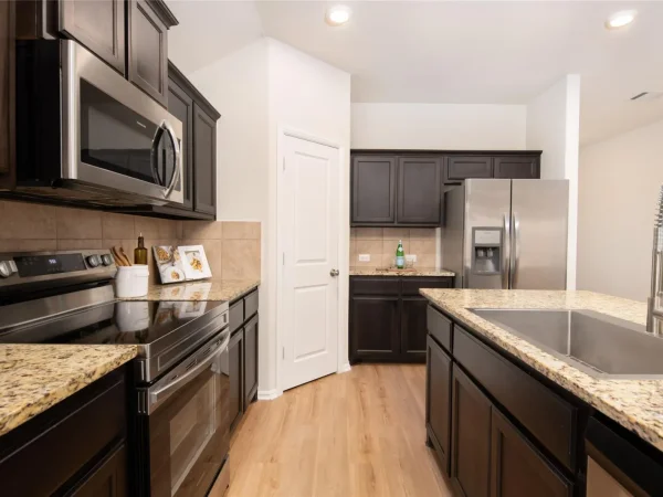 After: kitchen with new LVP flooring in Keller, TX