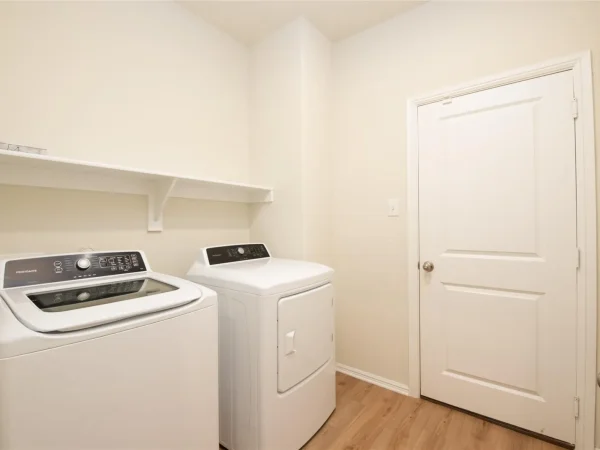 After: laundry room with new LVP flooring in Keller, TX