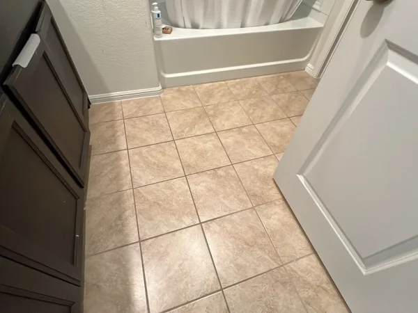 Before: bathroom with beige tile floor in Keller, TX