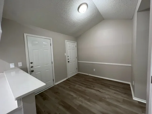 After: hallway repainted in light gray in Dallas, TX