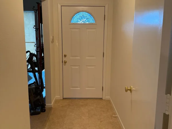 After: freshly painted entry hall in Dallas, TX