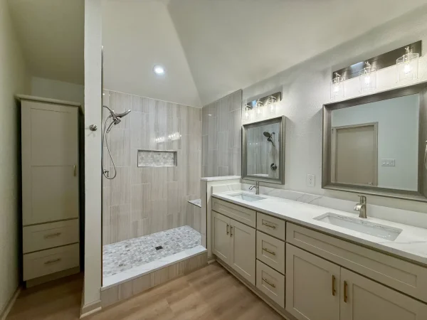After: primary bathroom with custom walk-in shower and new double vanity in Dallas, TX