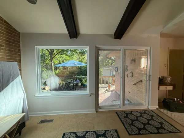 After: new sliding patio door and picture window seen from inside in Dallas, TX