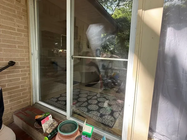 Before: old aluminum sliding patio door in Dallas, TX