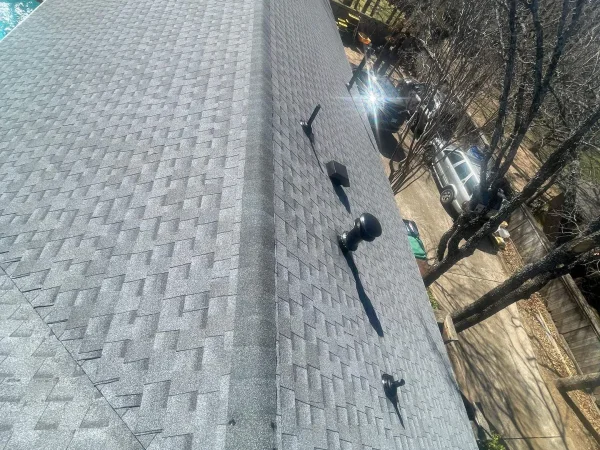 After: new shingles, ridge and roof vents in Denton, TX