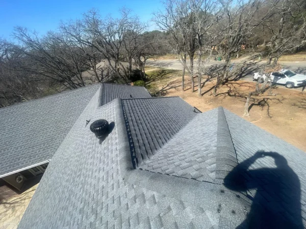 After: completed roof seen from the ridge in Denton, TX