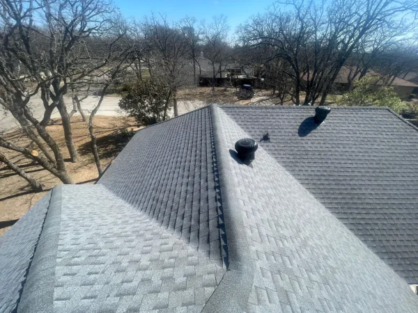 After: new ridge cap and valleys on the GAF roof in Denton, TX