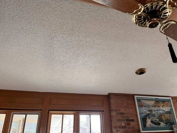 After: living room ceiling repaired and repainted in Denton, TX