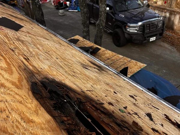 During construction: rotted roof decking found under the old shingles in Denton, TX