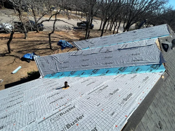 During construction: synthetic underlayment over the new decking in Denton, TX