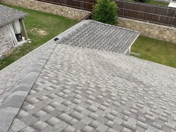 After: finished roof slopes over the backyard in Melissa, TX