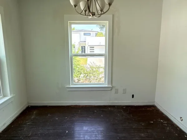 After: dining room with a new white vinyl single-hung window in Dallas, TX